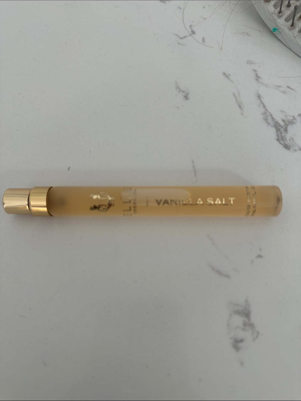 Vanilla Salt Lip Gloss Stick in Pale Gold - Elle